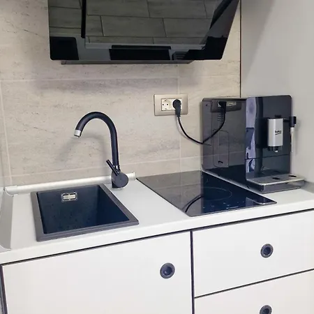 Apartament Breeze Alezzi *